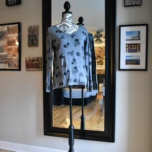 gray with black floral pattern long sleeve tee
